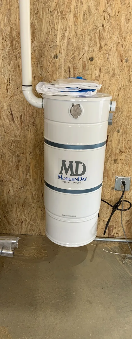Installed central vacuum power unit in a home